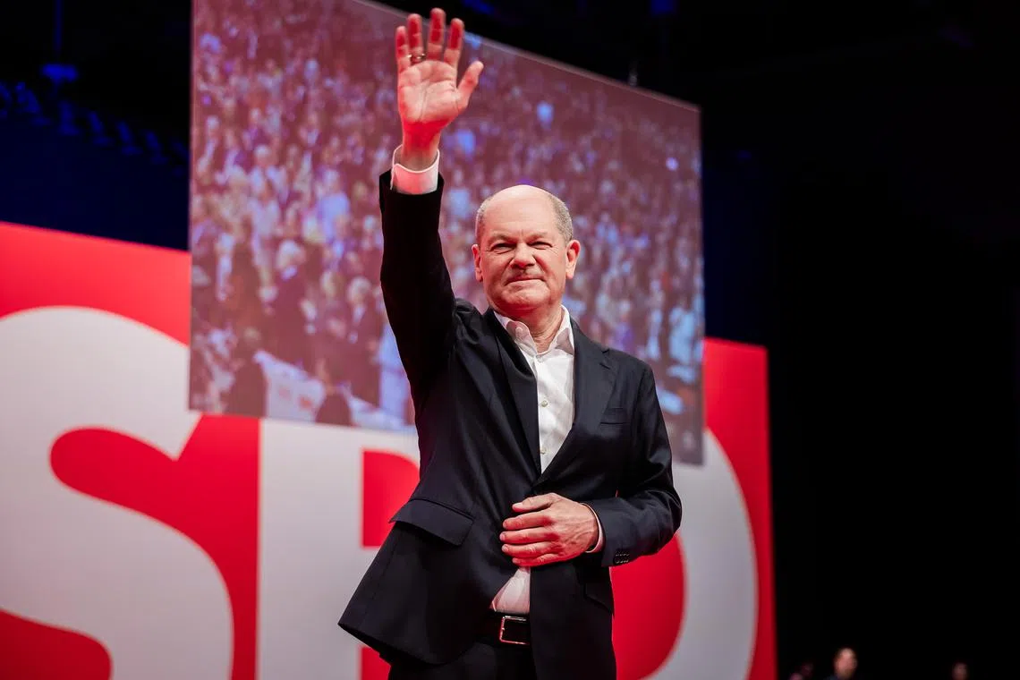 epa11818319 German Chancellor Olaf Scholz thanks the SPD delegates after delivering his speech at the convention of Germany's Social Democratic Party (SPD) in Berlin, Germany, 11 January 2025. The SPD kicks off the critical phase of the election campaign and officially elects Olaf Scholz as its candidate for chancellor in the general elections to be held on 23 February 2025.  EPA-EFE/CHRISTOPH SOEDER