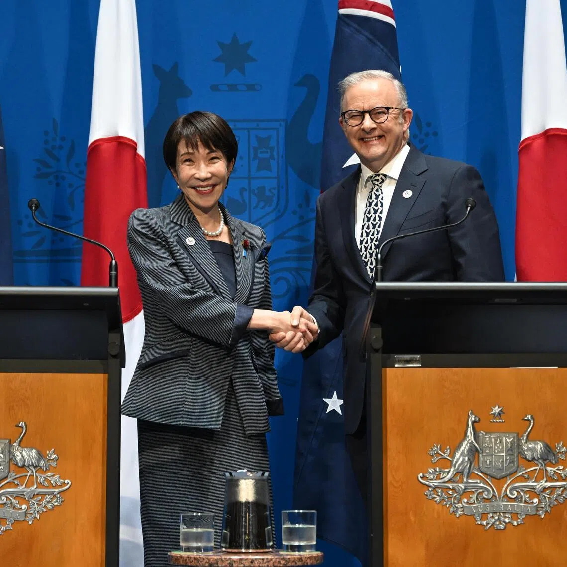 Australian Prime Minister Anthony Albanese (right) and Prime Minister of Japan Sanae Takaichi shaking hands during their joint appearance at Parliament in Canberra on May 4.