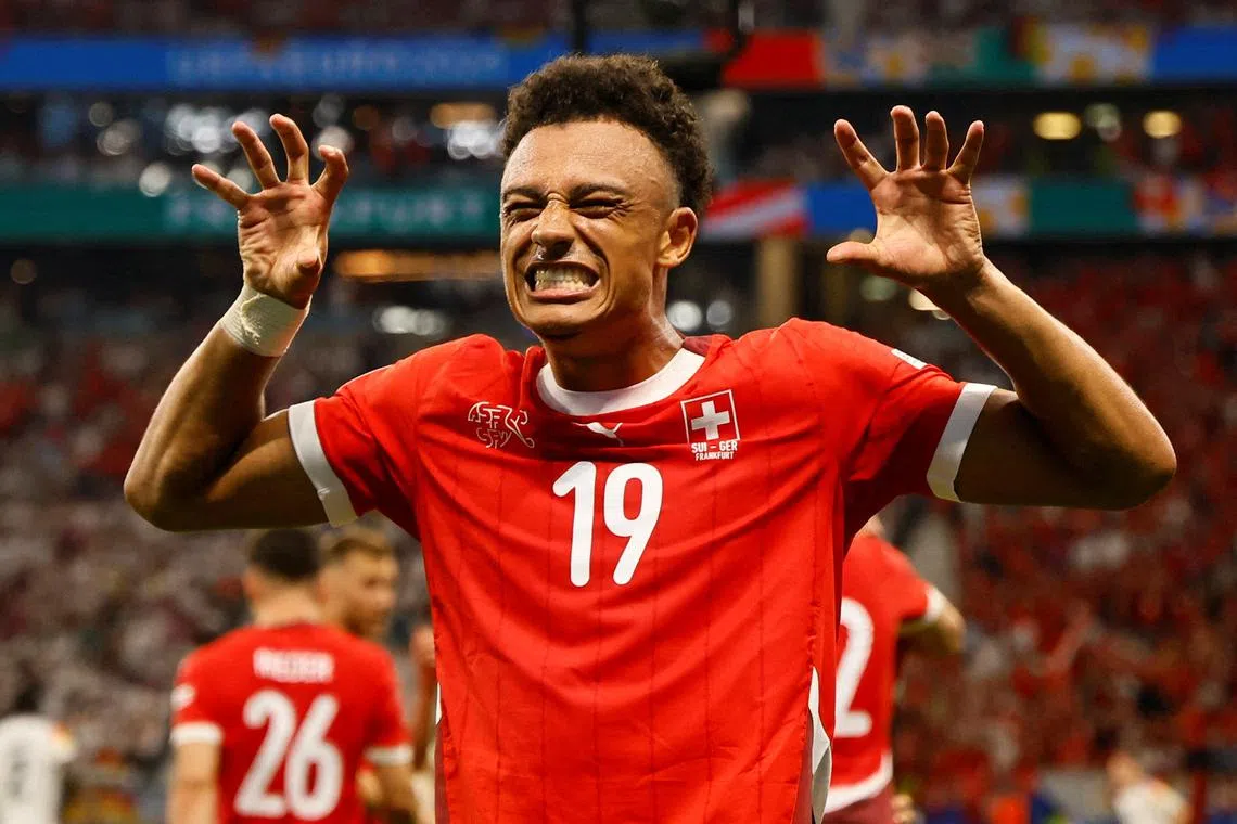 FILE PHOTO: Soccer Football - Euro 2024 - Group A - Switzerland v Germany - Frankfurt, Germany - June 23, 2024 Switzerland's Dan Ndoye celebrates scoring their first goal REUTERS/Wolfgang Rattay/File Photo