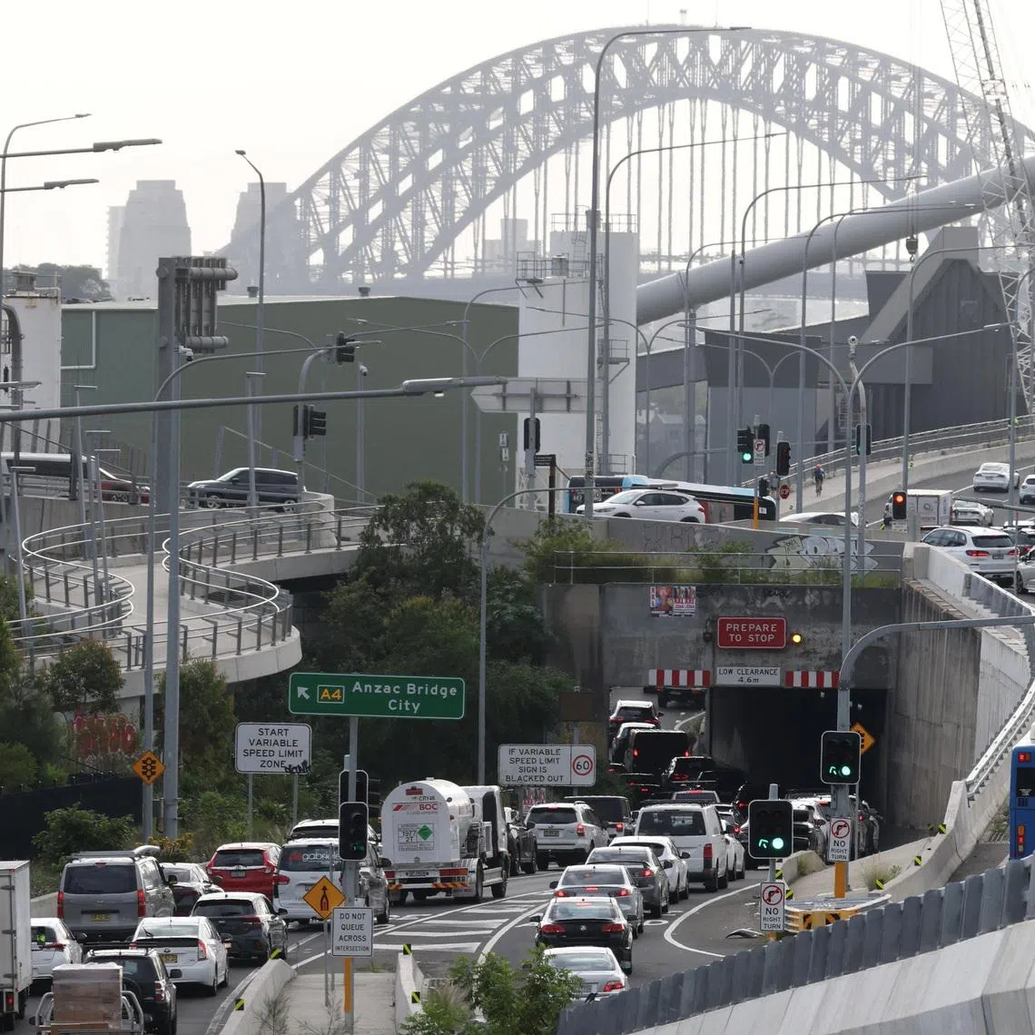Cars queue to cross Anzac Bridge during peak hour in Sydney, Australia, March 30, 2026. REUTERS/Hollie Adams/File Photo