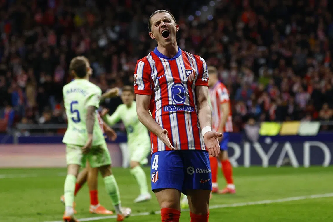 Soccer Football - LaLiga - Atletico Madrid v FC Barcelona - Metropolitano, Madrid, Spain - March 16, 2025 Atletico Madrid's Conor Gallagher reacts after FC Barcelona's third goal scored by Lamine Yamal REUTERS/Susana Vera