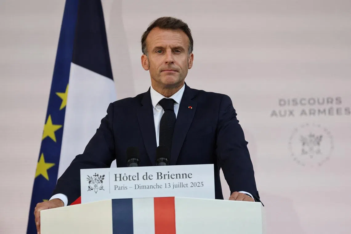 France's President Emmanuel Macron delivers a speech to army leaders, on the eve of the annual Bastille Day Parade in the French capital, at l'Hotel de Brienne in Paris, France July 13, 2025.     LUDOVIC MARIN/Pool via REUTERS