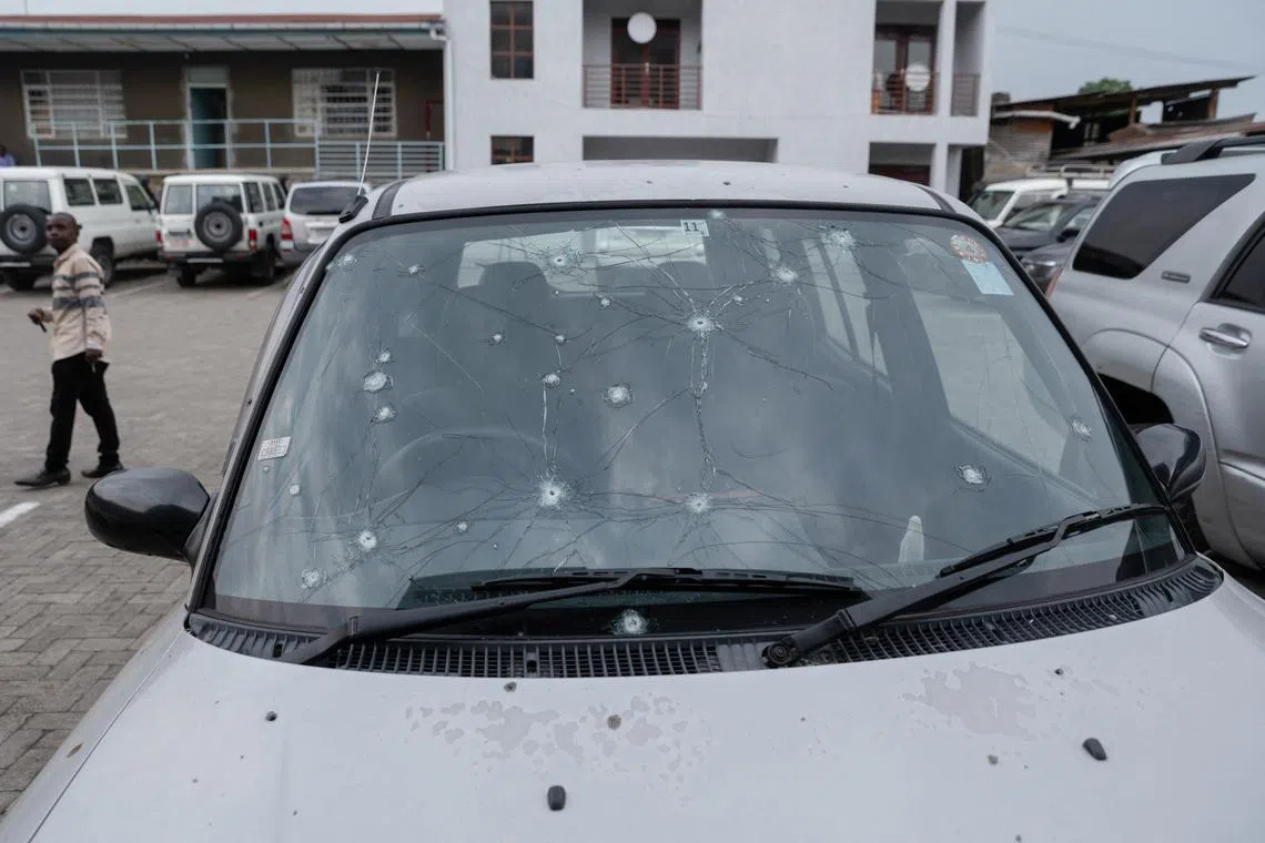 FILE PHOTO: A priest's vehicle sits damaged from fighting days after Goma was taken by M23 rebels, eastern Democratic Republic of the Congo, February 5, 2025. REUTERS/Arlette Bashizi/File Photo