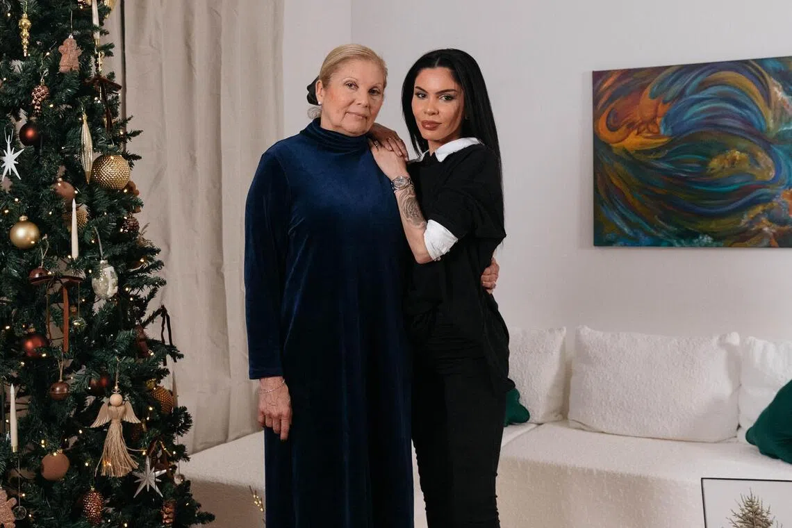 Camila Lincowski, right, with her mother, Oniria Correa, at the home Lincowski bought for her in Henderson, Nev., Nov. 12, 2025. While growing up, Lincowski promised her mother sheÕd buy her a house. (Mikayla Whitmore/The New York Times)
