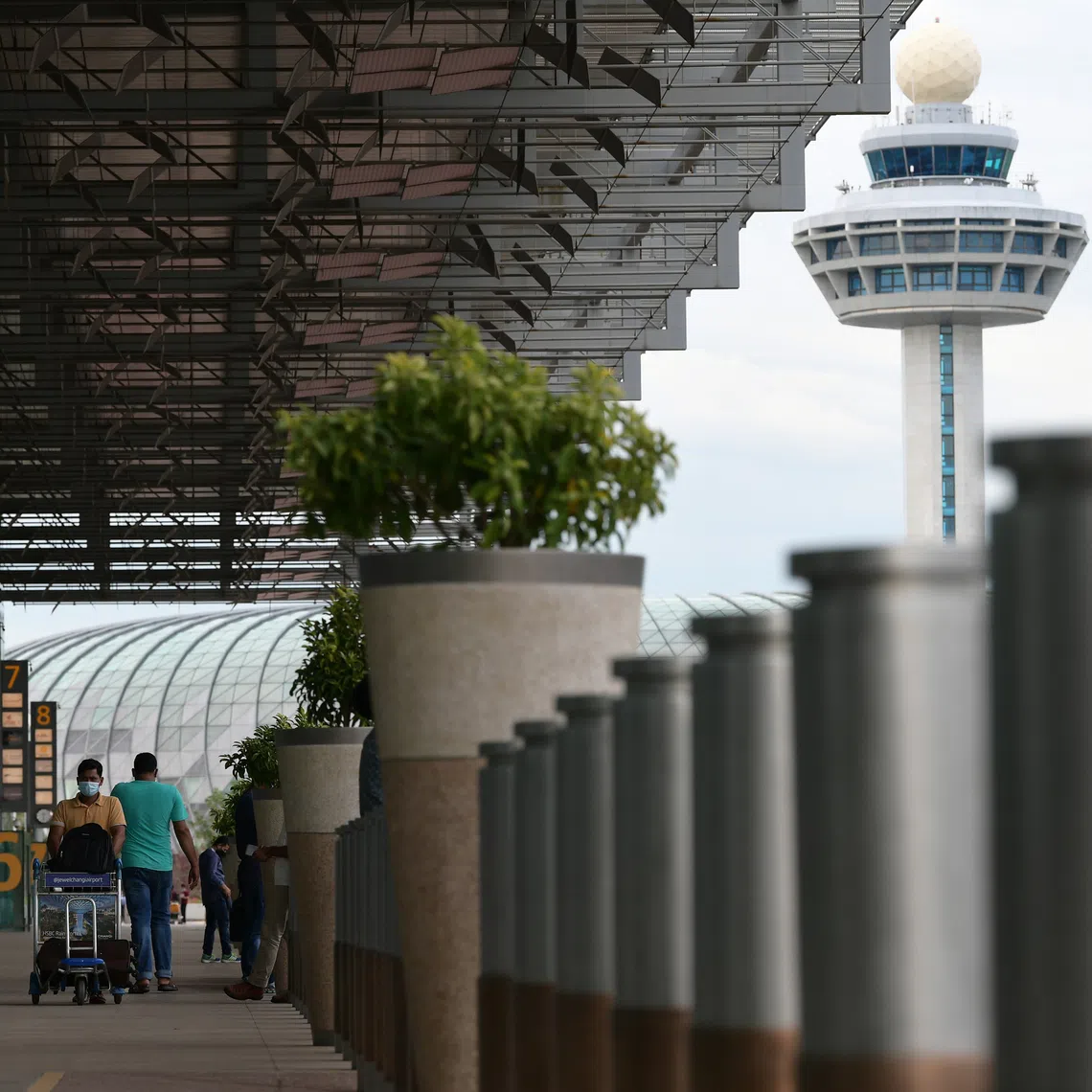 The men were arrested during an operation by officers from the Airport Police Division at Changi Airport Terminal 4 targeting theft cases on board aircraft.