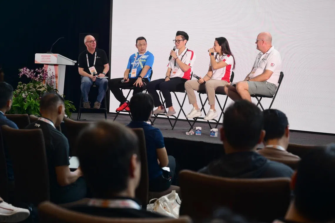 ST20241106_202454800409 mtsport06/Azmi Athni/ Melvyn Teoh//

(From left) A panel discussion, moderated by Mr Richard Gordon, CEO of Singapore Gymnastics, consisting of MrPaulus Firman, Singapore Olympics badminton coach, Dr Harry Lim, senior sports psychologist from the Singapore Sport Institute, Ms Amita Berthier, Team Singapore fencing olympian, and Mr Mick Massey, coach for Singapore?s paralympian Yip Pin Xiu, at the Singapore Sport & Performance (SSP) X SingHealth Duke-NUS Sport and Exercise Medicine (SSEM) Conference 2024 on Nov 6. 

ST PHOTO: AZMI ATHNI