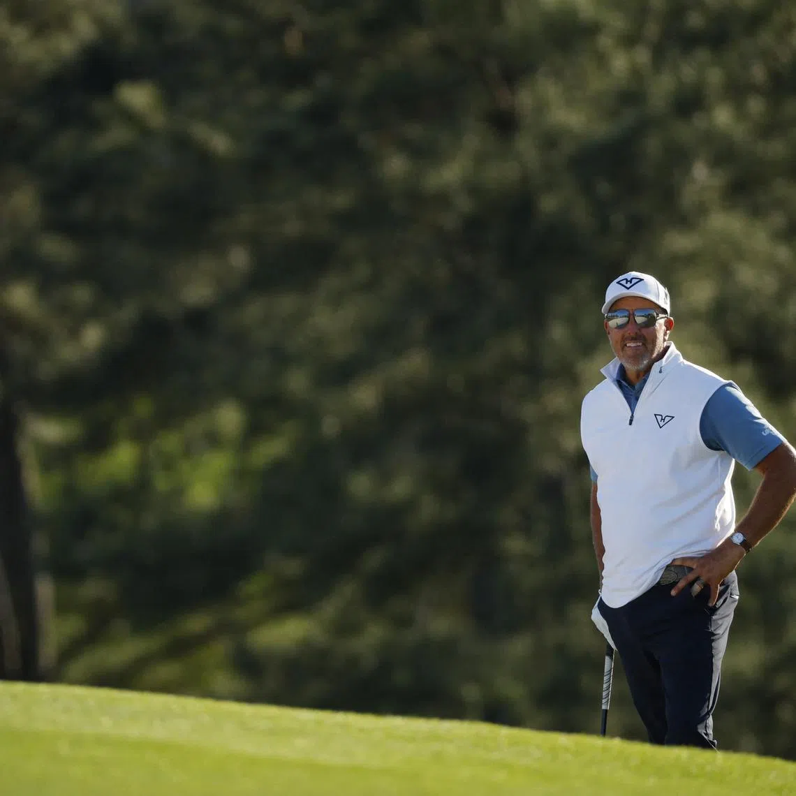 Golf - The Masters - Augusta National Golf Club, Augusta, Georgia, U.S. - April 11, 2025 Phil Mickelson of the U.S. looks towards the green on the 18th hole during the second round REUTERS/Brian Snyder