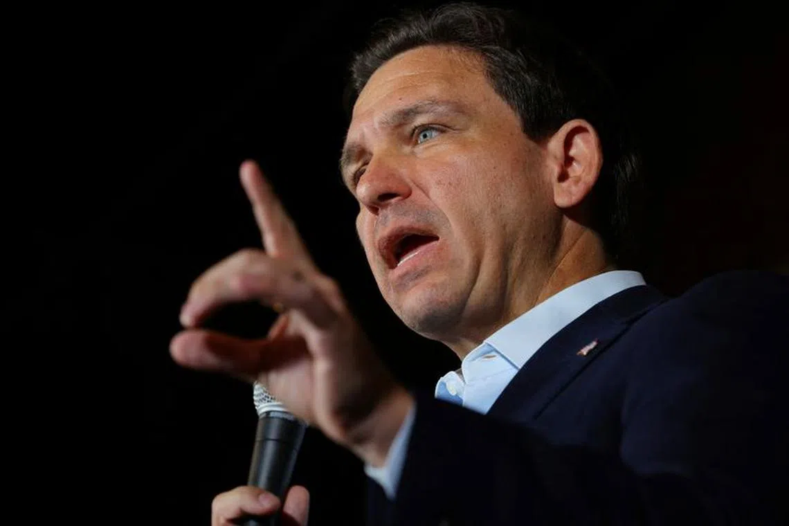 FILE PHOTO: Republican presidential candidate and Florida Governor Ron DeSantis speaks during a campaign stop in Manchester, New Hampshire, U.S., August 19, 2023.     REUTERS/Brian Snyder/File Photo
