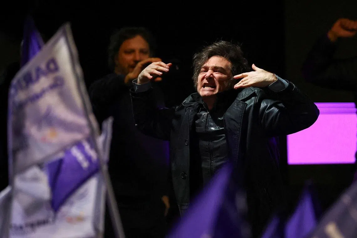 FILE PHOTO: Argentina's President Javier Milei gestures during the closing campaign rally of the La Libertad Avanza party, days before the legislative elections in the province of Buenos Aires, in Moreno on the outskirts of Buenos Aires, Argentina, September 3, 2025. REUTERS/Agustin Marcarian/File Photo