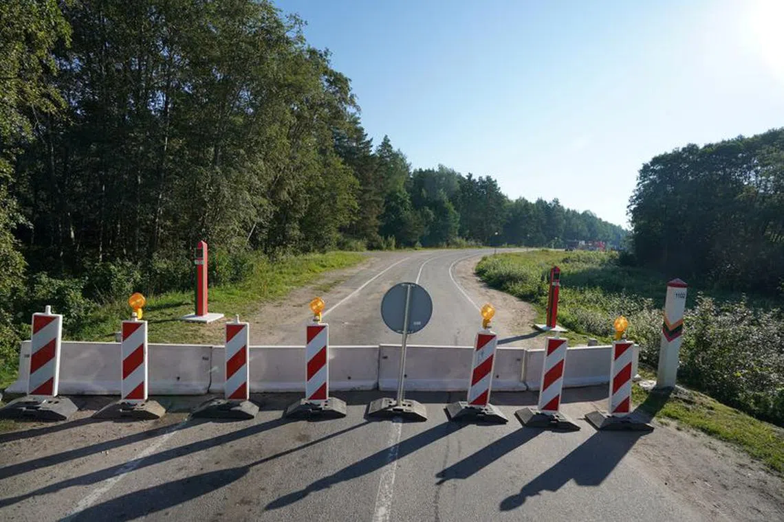 Concrete road blocks are placed at the border crossing with Belarus in Sumskas, Lithuania August 18, 2023. REUTERS/Janis Laizans/File Photo