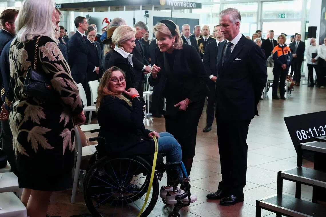 Belgium’s King Philippe and Queen Mathilde meet American Para-Equestrian athlete Beatrice de Lavalette at Brussels Airport in Zaventem, Belgium on March 22. 