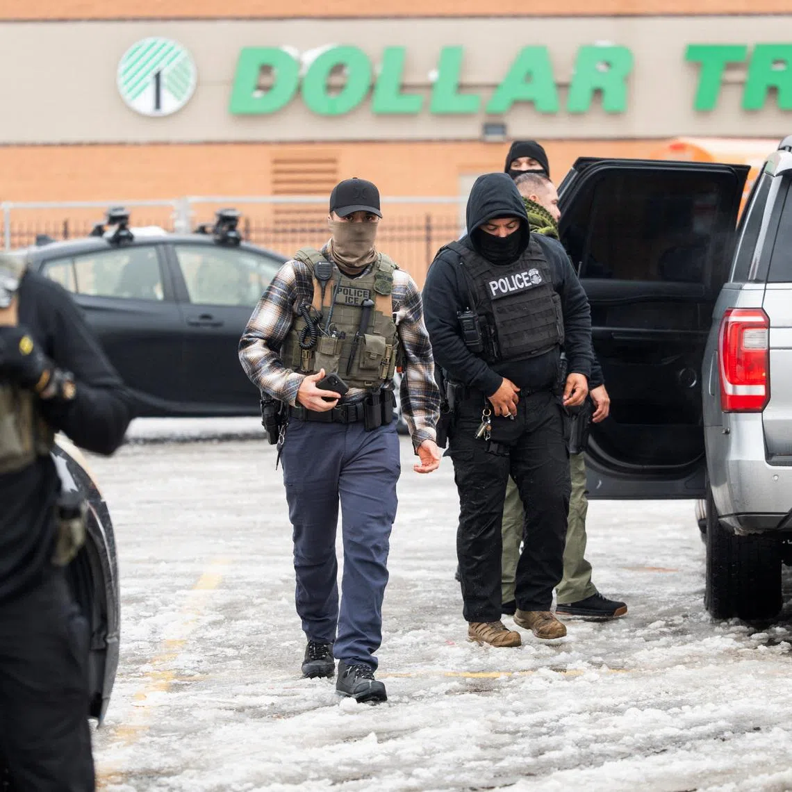 Members of U.S. Immigration and Customs Enforcement (ICE) conduct a raid as part of U.S. President Donald Trump's immigration policy in Minneapolis, Minnesota, U.S., January 6, 2026.  REUTERS/Tim Evans