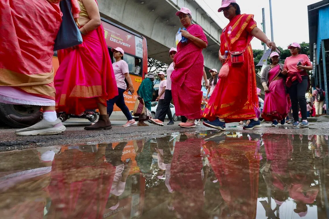 epa12446318 Indian women who wear sarees, doctors, nurses and breast cancer survivors participate in 'Saree Run' and some walk during a 'National Breast Cancer' themed 'Every Story is Unique, Every Journey Matters' awareness campaign in Bangalore, India 11 October 2025. United States as National Breast Cancer Awareness Month (NBCAM) was founded in 1985 to increase awareness of the disease prevention, diagnosis, treatment, cure and the fight against breast cancer. Breast cancer is the most commonly diagnosed cancer among women worldwide. In 2022, approximately 2.3 million women were diagnosed and another 670,000 died from the disease.  EPA/JAGADEESH NV