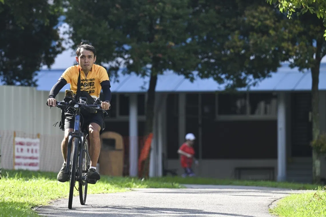 Delivery rider works long hours under the sun
