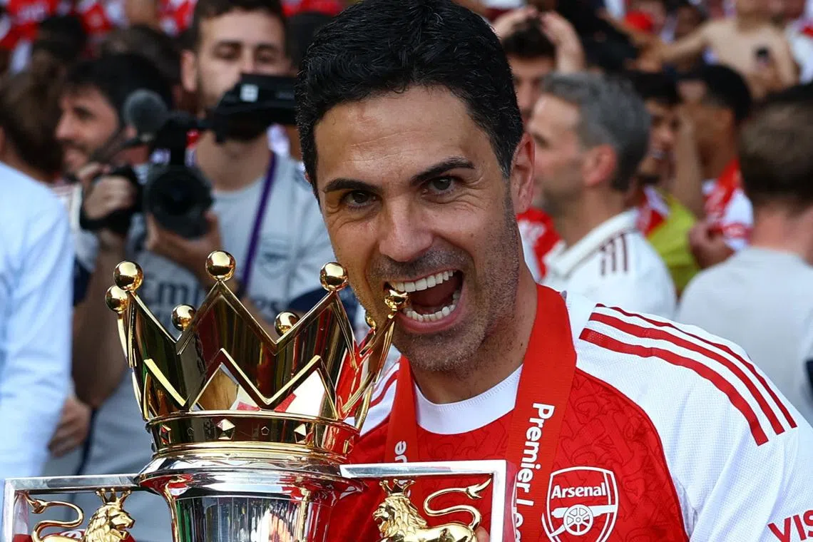 Arsenal manager Mikel Arteta celebrates with the trophy after winning the Premier League, Soccer Football, Premier League, Crystal Palace v Arsenal, Selhurst Park, London, Britain on May 24, 2026. Action Images via Reuters/Matthew Childs