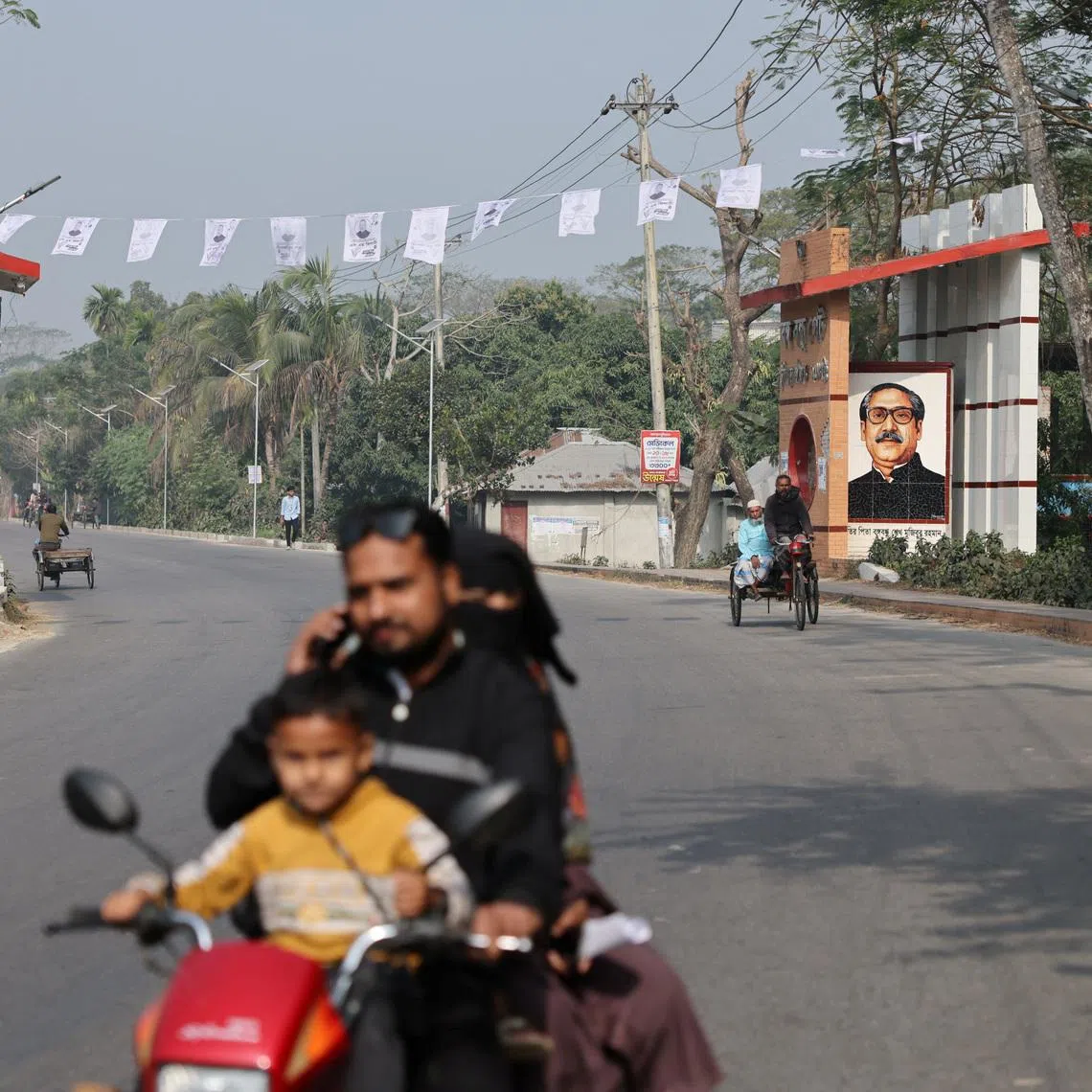 Images of Sheikh Mujibur Rahman, the father of former Bangladeshi prime minister Sheikh Hasina, on display at the Bangabandhu Gate in Gopalganj.