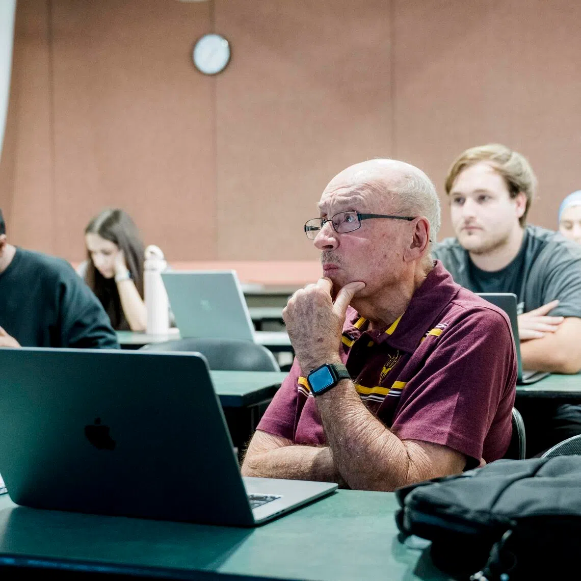 Mr David Mills, a resident of the retirement community Mirabella, listens during a neuroscience lesson at Arizona State University in Tempe, Arizona, on Sept 8.