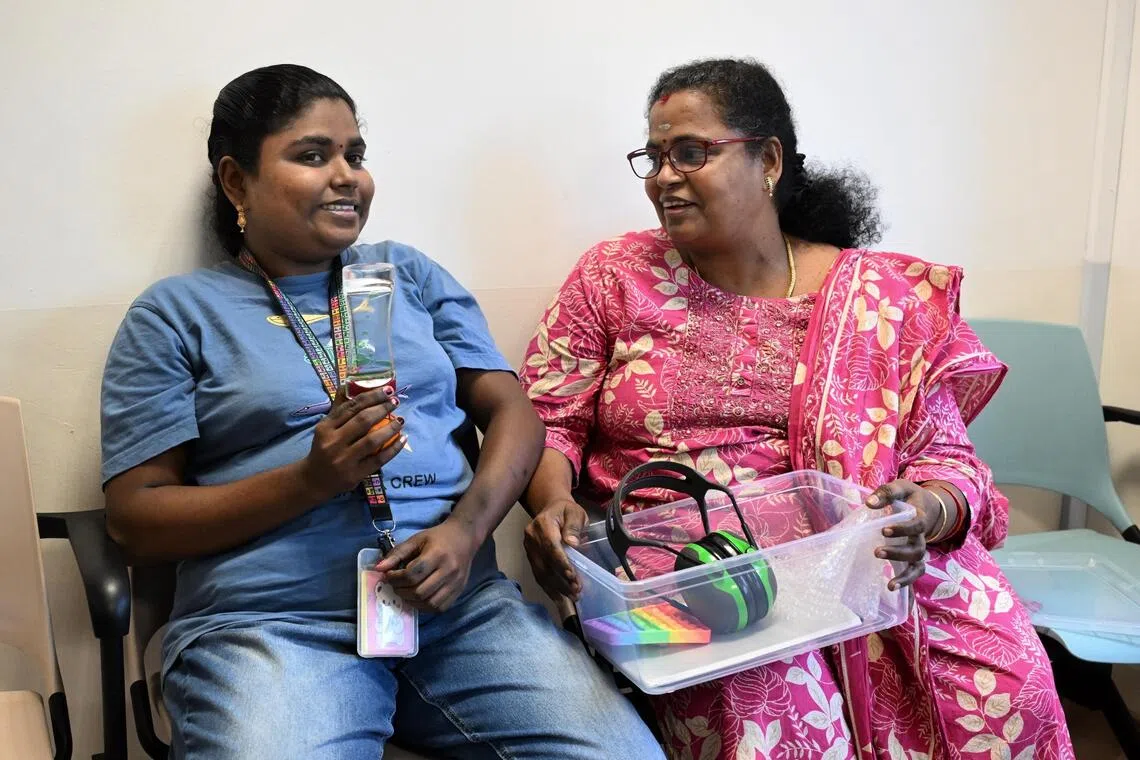 Subramanian Vasuki (right) said her daughter Archanaa used to be afraid of having her blood drawn, but now undergoes the procedure without fear at the SPARk Clinic in Ang Mo Kio polyclinic.