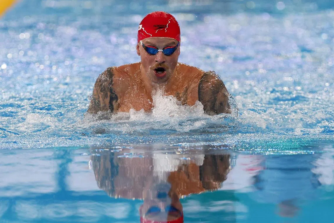 Adam Peaty of Britain describes his third-place finish in the men's 100m breaststroke final at the 2024 World Aquatics Championships in Doha on Feb 12 as "bittersweet".