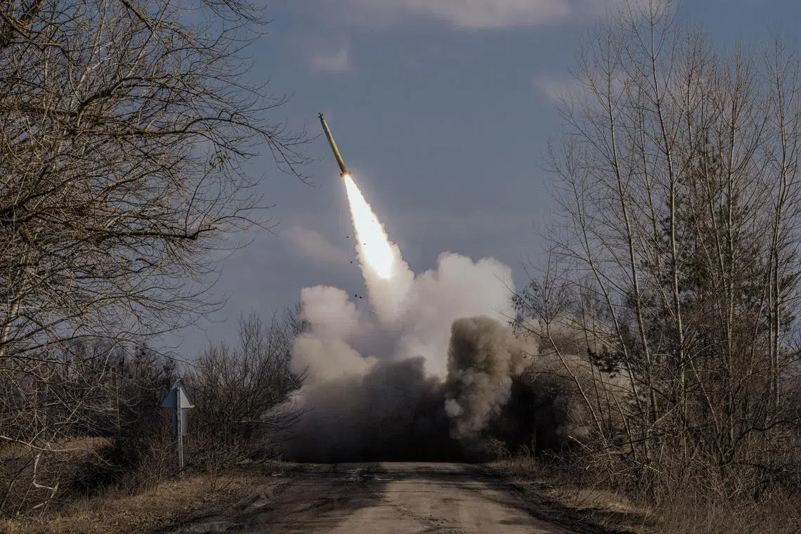 Ukrainian soldiers fire a US-made rocket on Russian positions near the frontline.