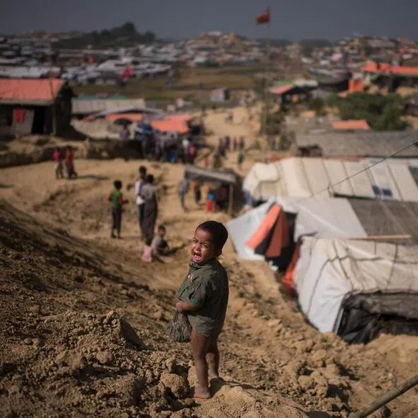 A Rohingya refugee child standing near a refugee camp at Cox's Bazar, Bangladesh.