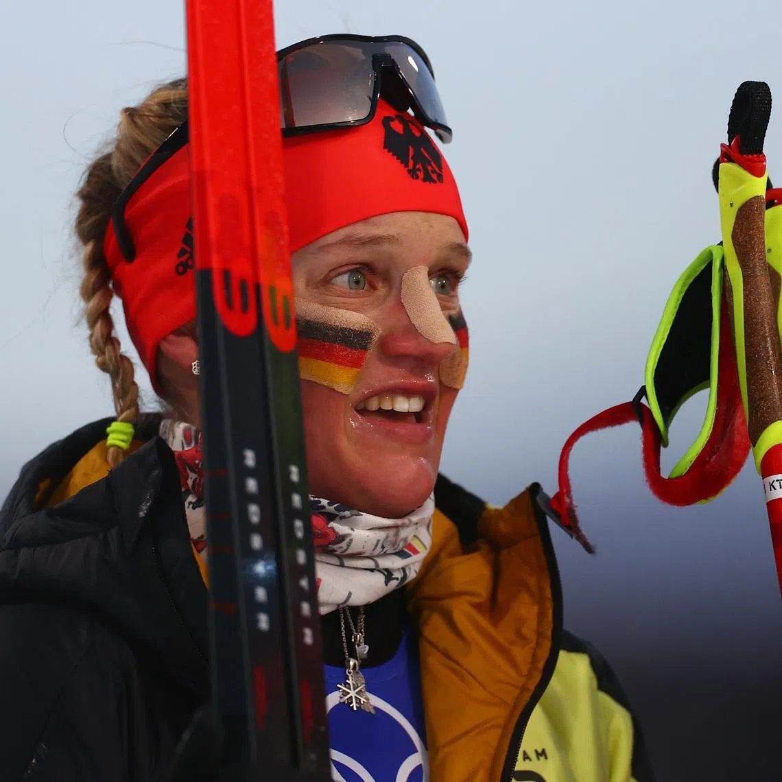 FILE PHOTO: 2022 Beijing Olympics - Cross-Country Skiing - Women's Team Sprint Classic Final - National Cross-Country Centre, Zhangjiakou, China - February 16, 2022.  Victoria Carl of Germany reacts after winning gold. REUTERS/Lindsey Wasson