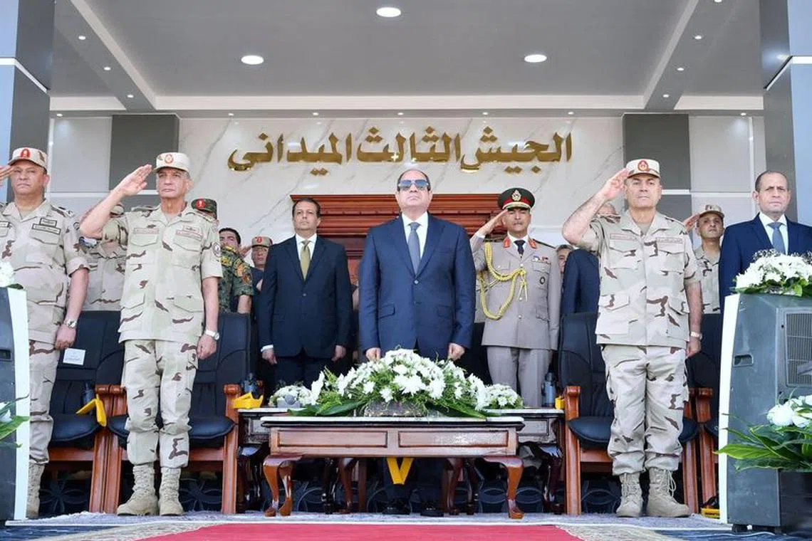 Egyptian President Abdel Fattah al-Sisi inspects the Egyptian military units in Suez, as he told the media in his speech that Cairo is playing a very positive role in de-escalating the Gaza crisis, Egypt, October 25, 2023 in this handout picture courtesy of the Egyptian Presidency. The Egyptian Presidency/Handout via REUTERS/File Photo