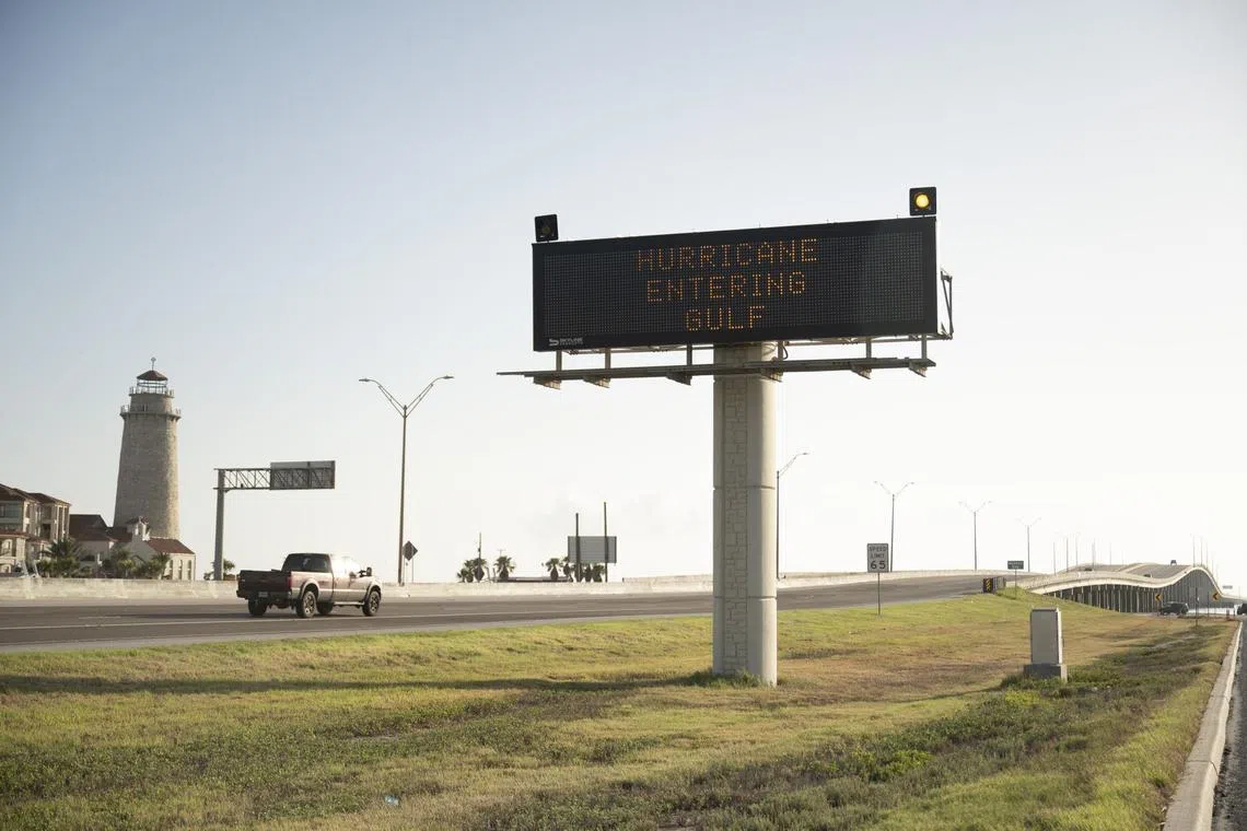 A traffic sign on US Highway 181 warns drivers ahead of Hurricane Beryl's landfall in Corpus Christi, Texas, on July 6, 2024.