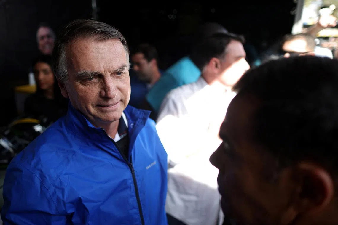 FILE PHOTO: Former Brazil's President Jair Bolsonaro visits the Capital Moto Week in Brasilia, Brazil, July 29, 2025. REUTERS/Adriano Machado/File photo
