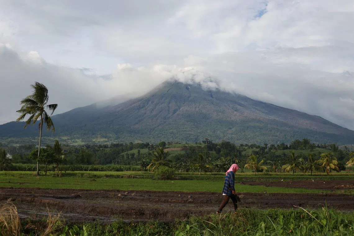 The Kanlaon volcano as seen from a village in La Castellana town, Negros Occidental province on Dec 10, 2024, a day after its eruption. 