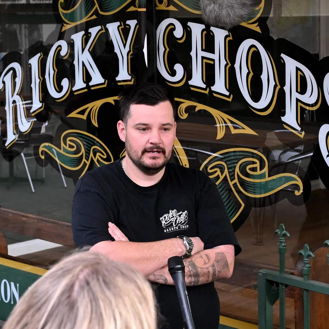 Barber Ricky Jefferies speaking to the media a day after tackling a man who attacked Australian politician Helen Haines.