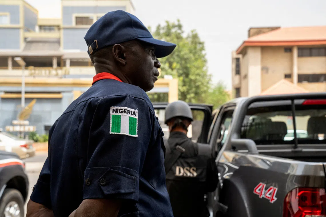 FILE PHOTO: A member of Nigerian security forces looks on before the court hearing of the leader of the proscribed Indigenous People of Biafra (IPOB) Nnamdi Kanu, in Abuja, Nigeria, March 19, 2024. REUTERS/Marvellous Durowaiye/File Photo