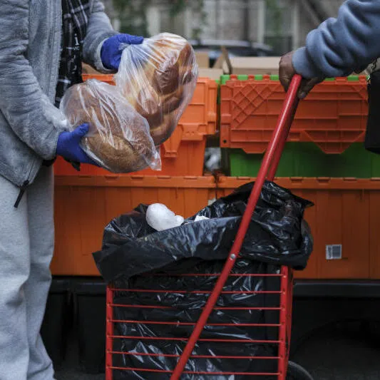 Volunteers distribute groceries at the Church of the Good Shepherd food pantry in Manhattan, New York, on Nov 1.