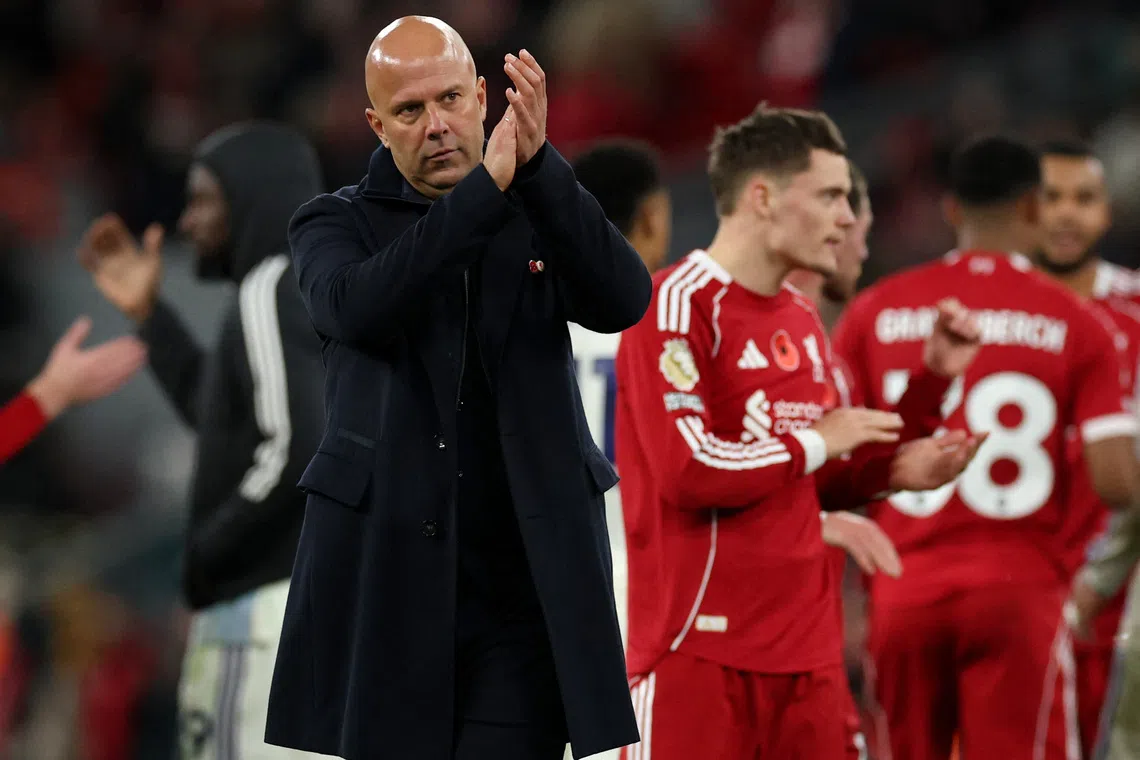 Soccer Football - Premier League - Liverpool v Aston Villa - Anfield, Liverpool, Britain - November 1, 2025 Liverpool manager Arne Slot applauds fans after the match REUTERS/Phil Noble