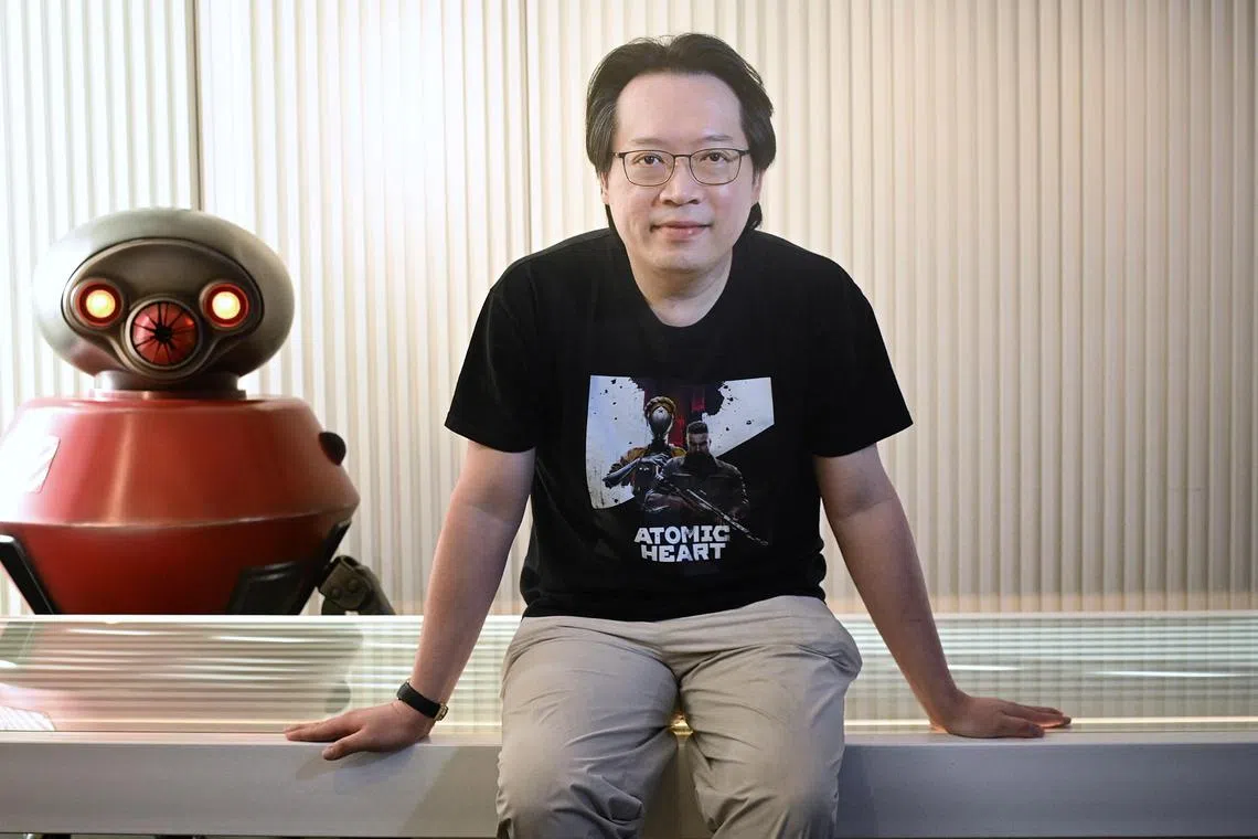Mr Jacky Choo with marketing collateral for Atomic Heart. Sales for the game in Asia made up 49.6 per cent of total global sales as of April 2023.