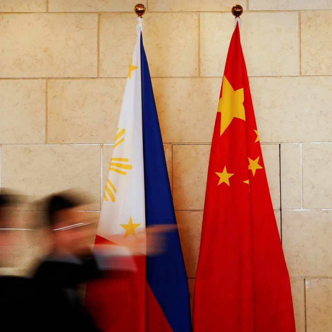 National flags are placed outside a room where Philippine Finance Secretary Carlos Dominguez and China's Commerce Minister Gao Hucheng address reporters after their meeting in Beijing, China, January 23, 2017. REUTERS/Damir Sagolj/File Photo