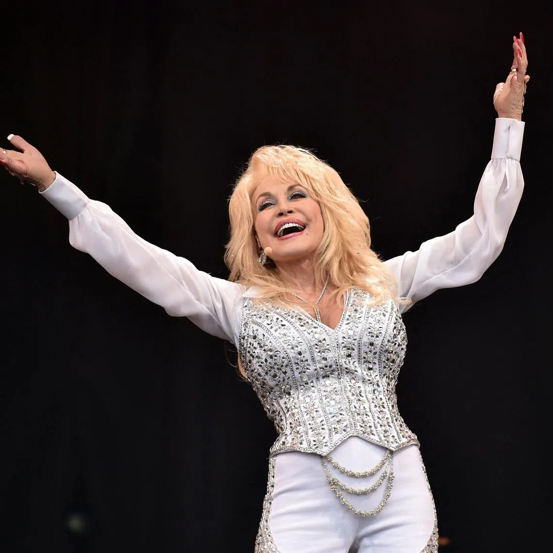 Dolly Parton grew up poor in Tennessee and became a household name with hits like Jolene.