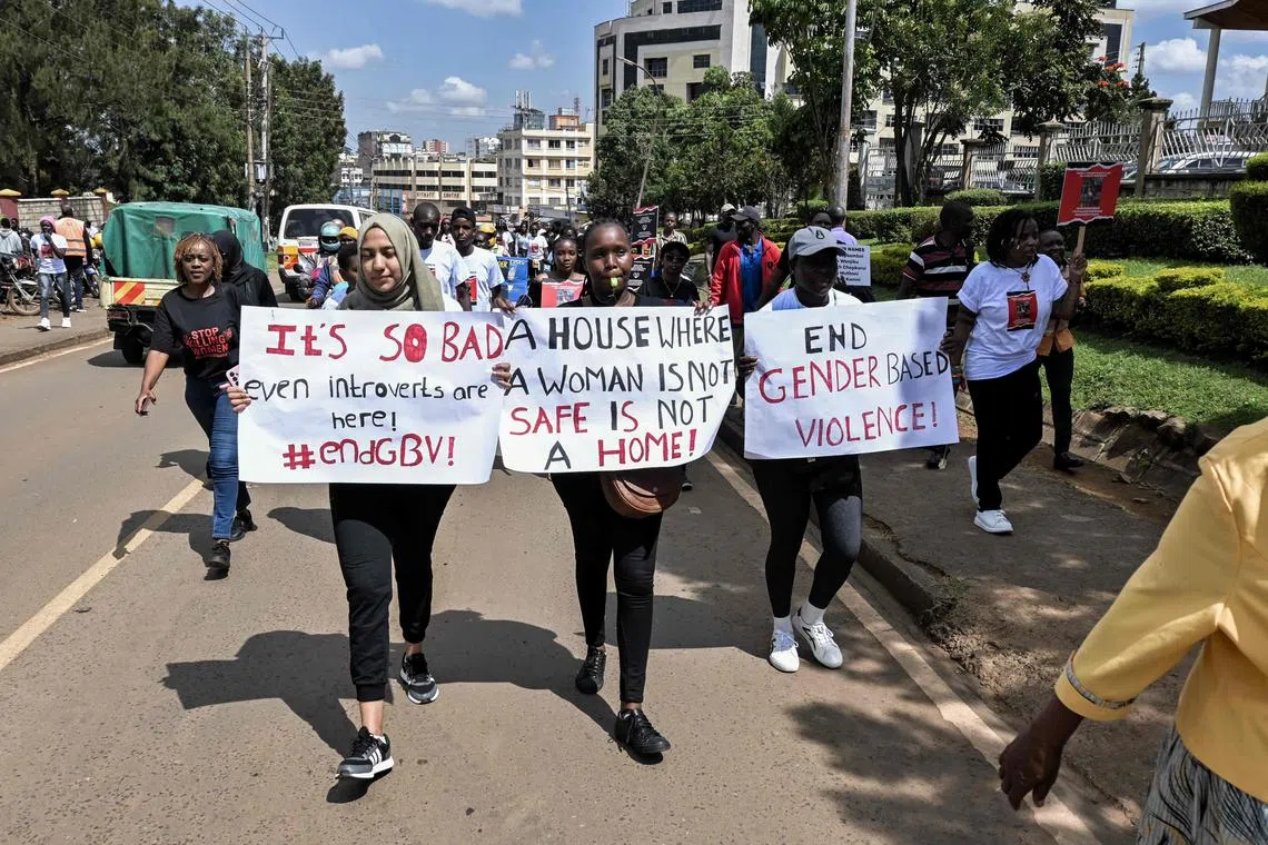 Activists and athletes march at a rally for murdered Olympian Rebecca Cheptegei in Eldoret town, in Kenya.