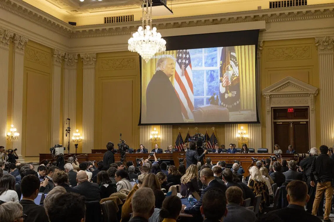 A video of former President Donald Trump is shown on a screen as the House committee investigating the Jan 6 attack on the US Capitol holds its last public meeting in Washington on Dec 19. 