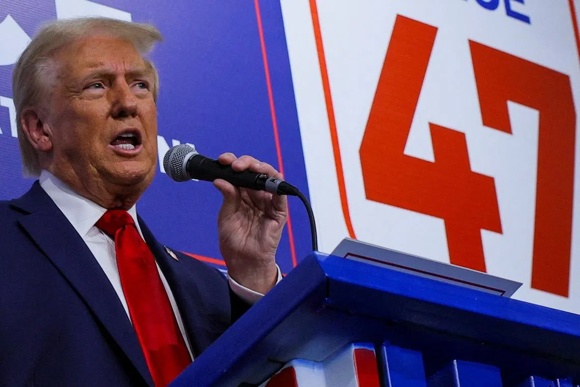 Republican presidential nominee and former U.S. President Donald Trump speaks as he visits a campaign office in Hamtramck, Michigan, U.S. October 18, 2024. REUTERS/Brian Snyder