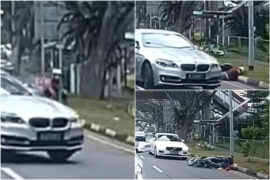 Dashboard camera footage shows a silver BMW changing lanes into the path of an oncoming motorcycle in the leftmost lane.