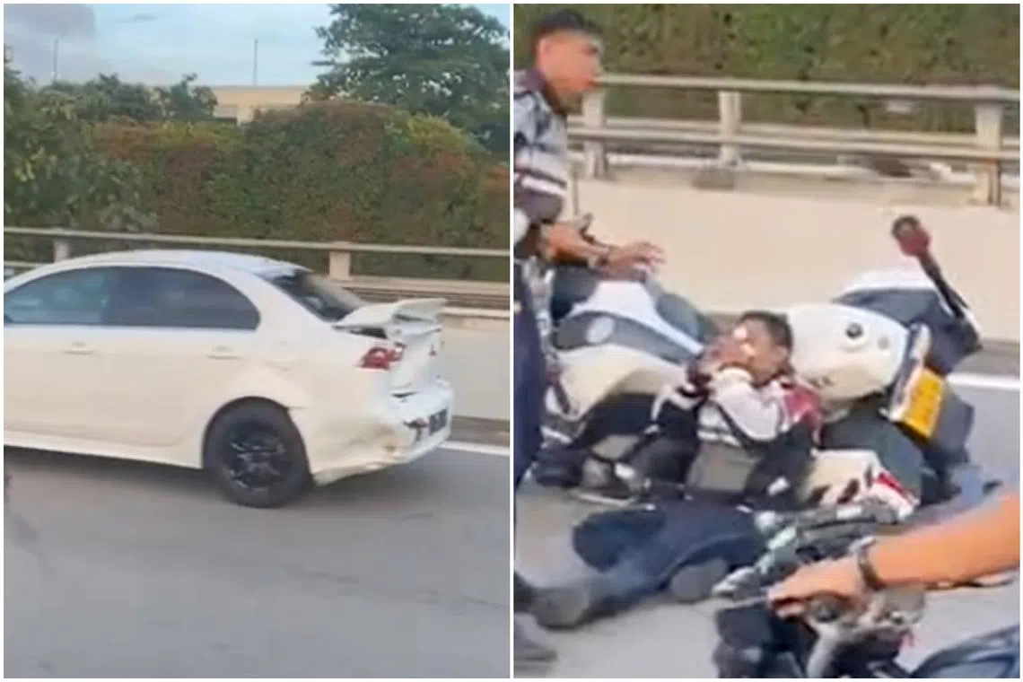 In a video online, a TP officer is seen clutching his face with something white, with a white Mitsubishi sedan parked ahead with a damaged rear.