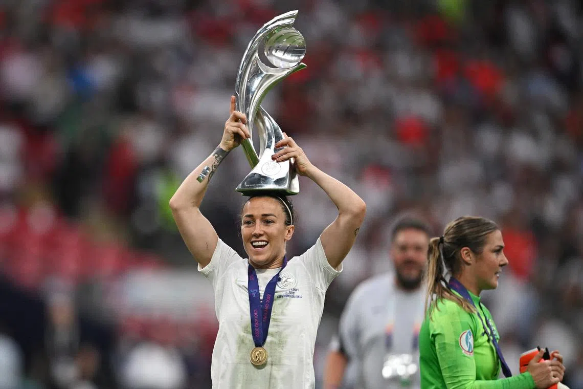 England's Lucy Bronze celebrates with the trophy after winning Women's Euro 2022.