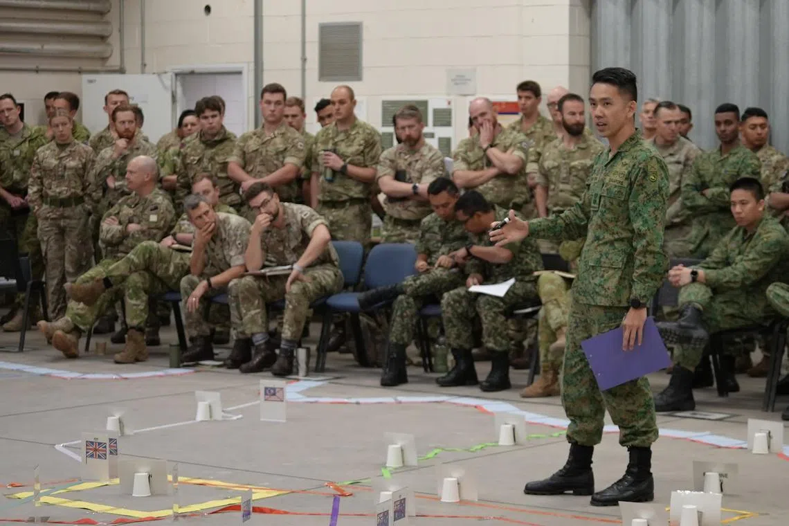 icsuman21 - Participants from the FPDA armies coordinating the details of the operation plan for the Battle Group Exercise.

PHOTO: MINDEF