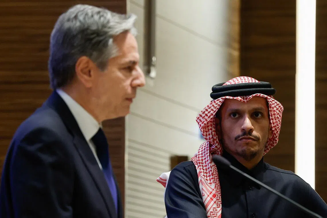 FILE PHOTO: U.S. Secretary of State Antony Blinken and Qatar's Prime Minister and Foreign Minister Sheikh Mohammed bin Abdulrahman Al Thani attend a press conference, during Blinken's week-long trip aimed at calming tensions across the Middle East, in Doha, Qatar, January 7, 2024. REUTERS/Evelyn Hockstein/Pool/File Photo