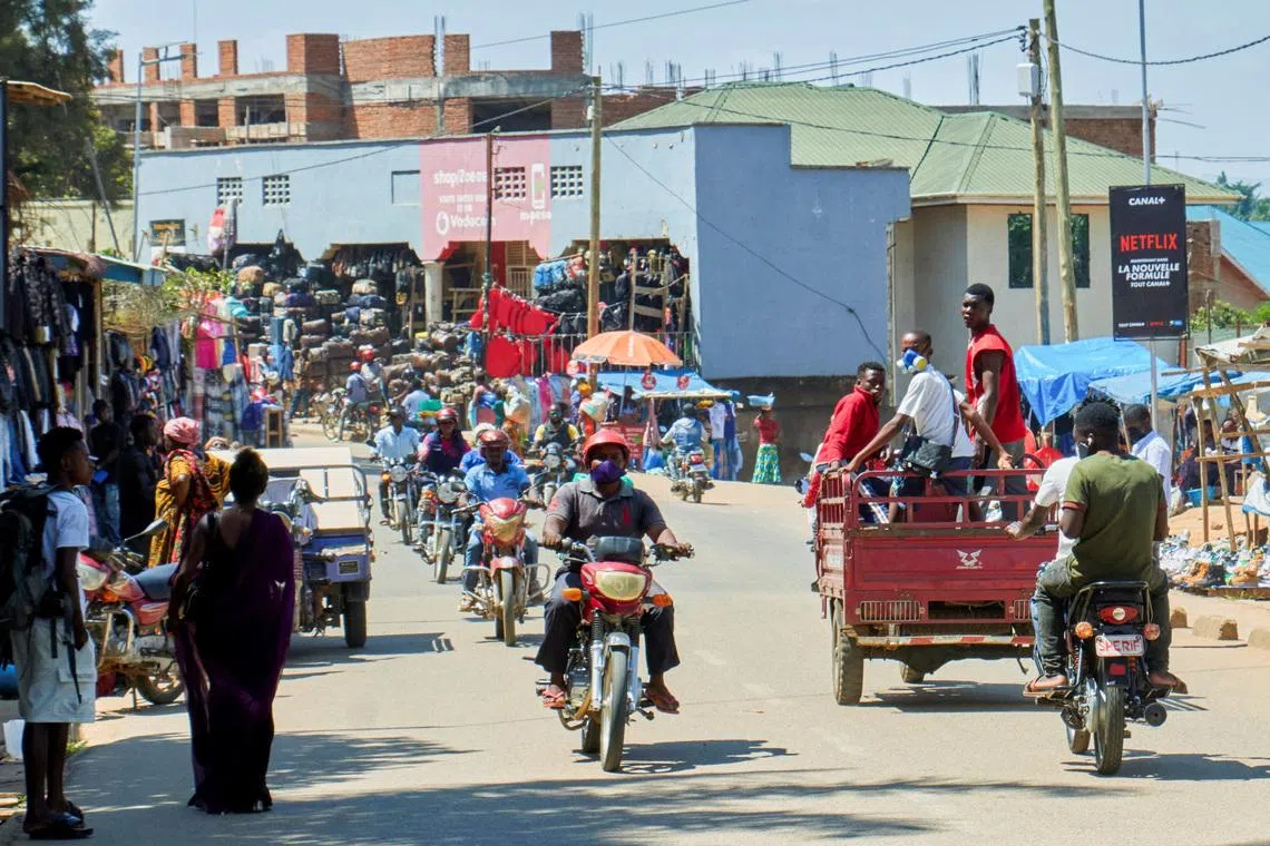 Motorcycle taxis ride along a street, as aid agencies intensify efforts to contain a new Ebola outbreak involving the Bundibugyo strain, in Bunia, Ituri province, Democratic Republic of Congo, May 22, 2026. REUTERS/Gradel Muyisa Mumbere