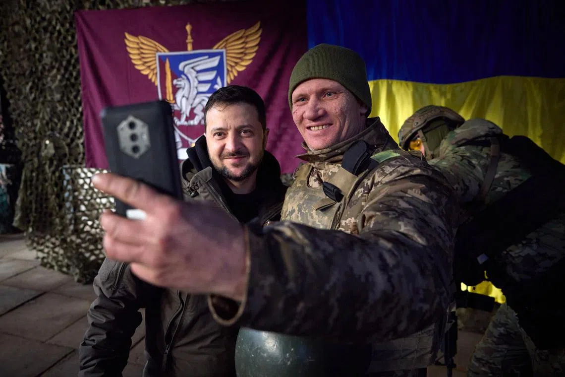 Ukrainian President Volodymyr Zelensky (left) poses with a serviceman after awarding troops in Slovyansk, Donetsk area, Ukraine, 06 December 2022 amid the Russian invasion. Russian troops entered Ukraine on 24 February 2022 starting a conflict that has provoked destruction and a humanitarian crisis.  EPA-EFE/PRESIDENTIAL PRESS SERVICE HANDOUT  HANDOUT EDITORIAL USE ONLY/NO SALES