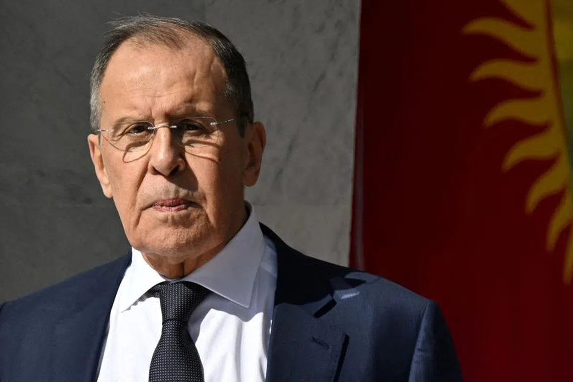 FILE PHOTO: Russia's Foreign Minister Sergei Lavrov waits before a meeting of Russia's President Vladimir Putin and Kyrgyzstan's President Sadyr Japarov in Bishkek, Kyrgyzstan October 12, 2023. Sputnik/Pavel Bednyakov/Kremlin via REUTERS/File Photo