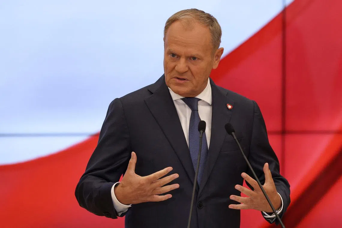 FILE PHOTO: Polish Prime Minister Donald Tusk speaks during a press conference announcing changes in his government in Warsaw, Poland, July 23, 2025. REUTERS/Kuba Stezycki/File Photo