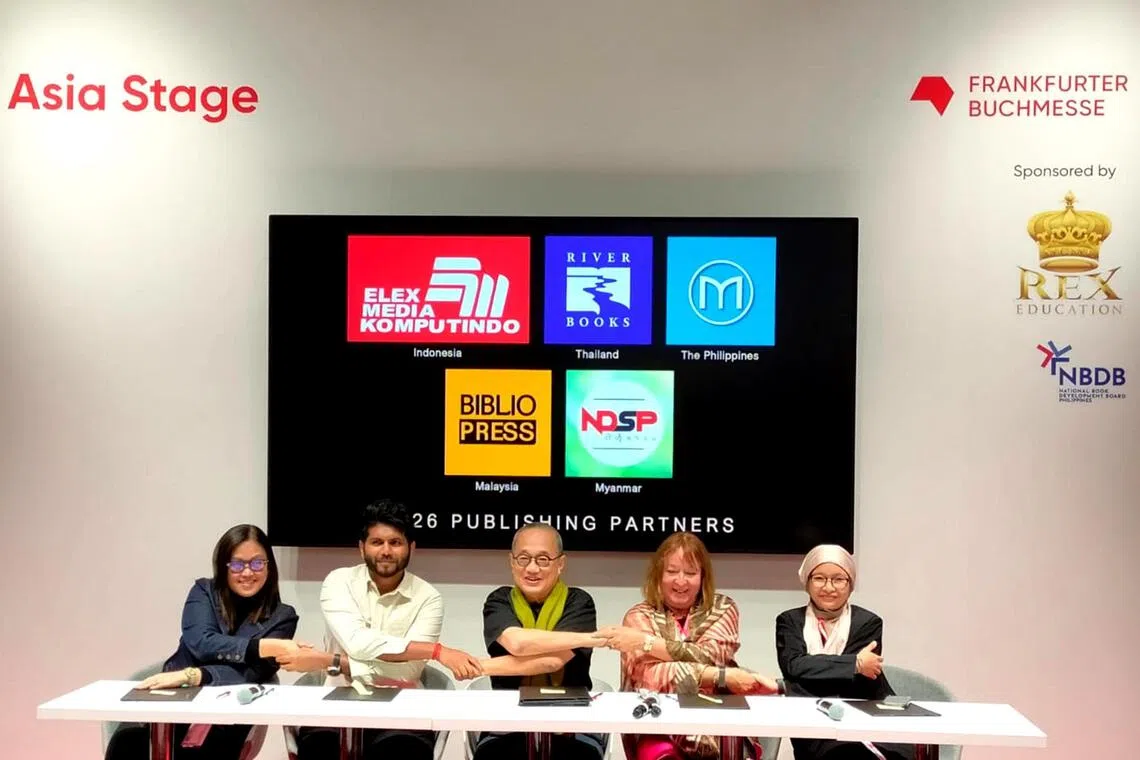 Epigram Literary Foundation founder Edmund Wee (centre) with (from left) Milflores Publishing publisher Andrea Pasion-Flores, The Biblio Press publisher Kiridaren Jayakumar, River Books editor and publisher Narisa Chakrabongse and Elex Media Komputindo editorial manager Jarwati. NDSP Books publisher Aung San Mon could not be in Frankfurt to sign the agreement.